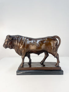 Bronze Bull on marble pedestal